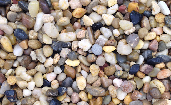 Assorted smooth gravel used as an aquarium substrate