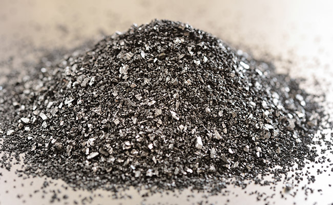 A pile of activated carbon ready to be used in an aquarium