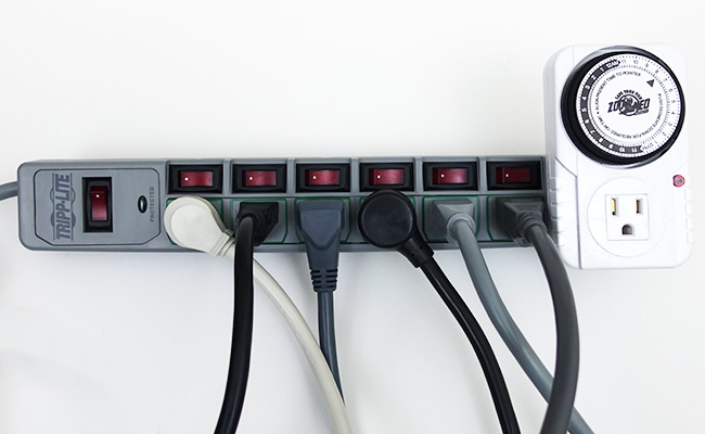 Tripp Lite power strip with electrical aquarium equipment plugged in