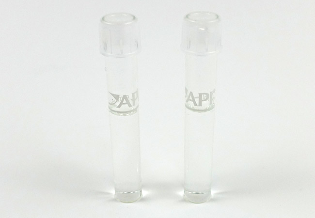 Two test tubes from aquarium test kit filled with water