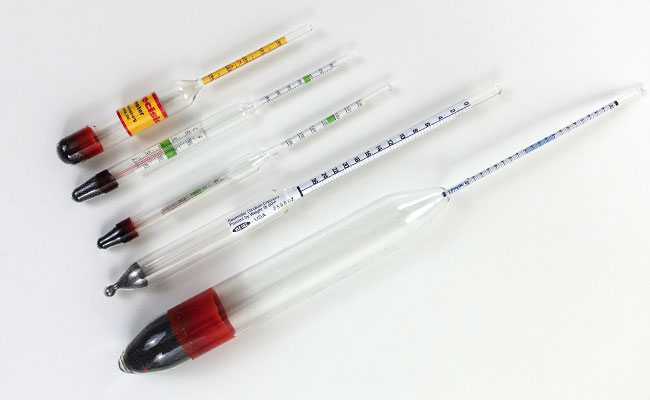Some of the different glass floating hydrometers that we tested in our aquarium