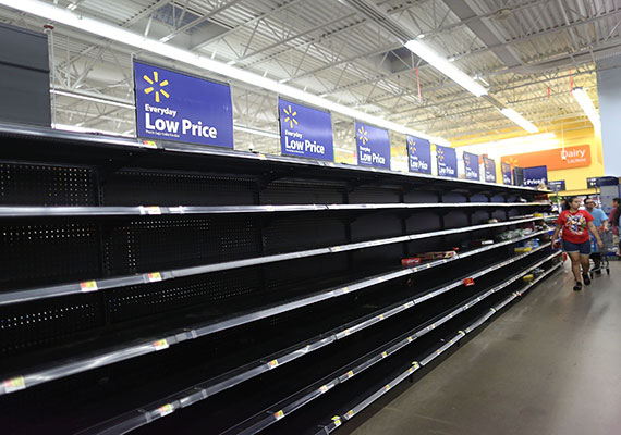 Walmart shelves stripped bare as people stock up on supplies after news of incoming hurricane