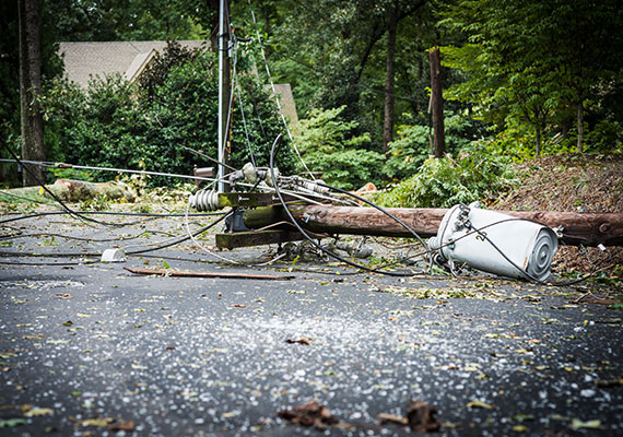 Downed power lines on street resulting in power outage